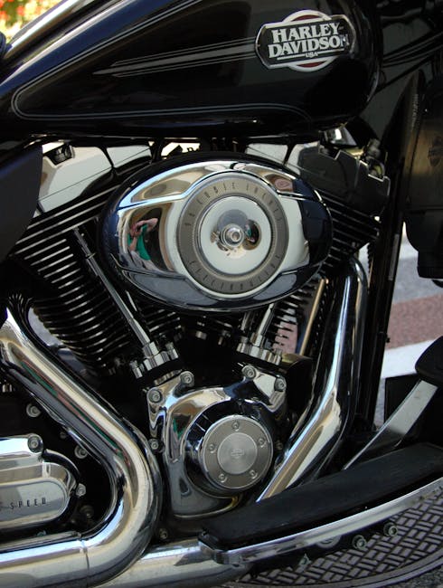 Detailed Image Of A Harley Davidson Motorcycle Engine Showcasing Chrome And Classic Design. Detailed image of a Harley Davidson motorcycle engine showcasing chrome and classic design.