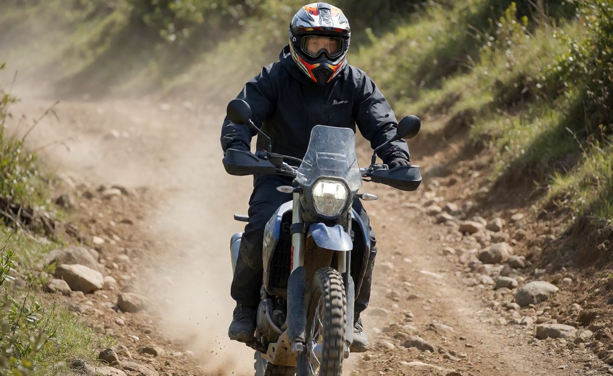 Off-Road Motorcycle In Trail Use Off-road motorcycle with rider on a dirt trail